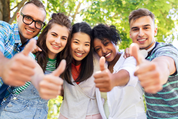 students-smiling-thumbs-up